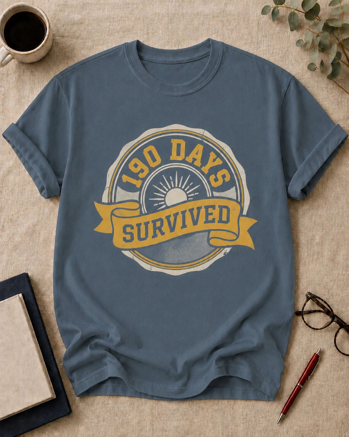 190 days. Survived — teacher t-shirt in Blue Jean, flat lay