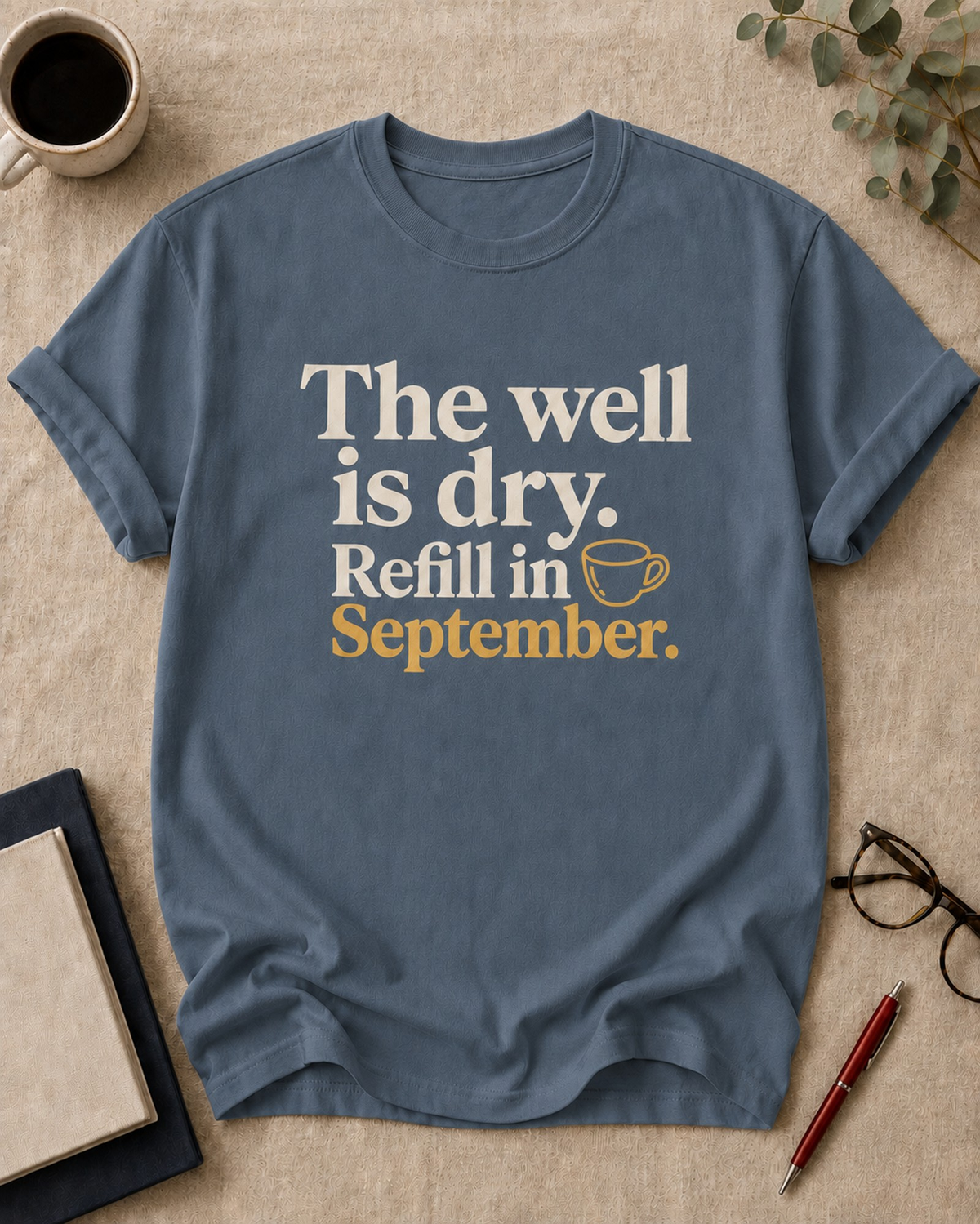The well is dry. Refill in September — teacher t-shirt in Blue Jean, flat lay