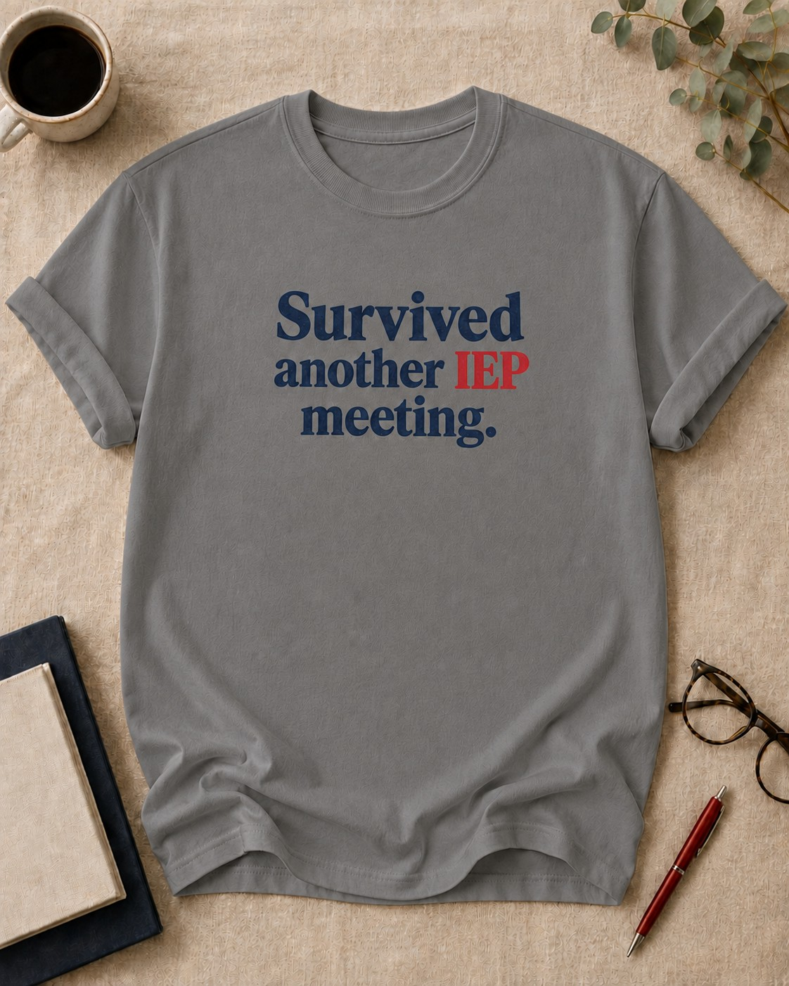 Survived another IEP meeting — teacher t-shirt in Grey, flat lay