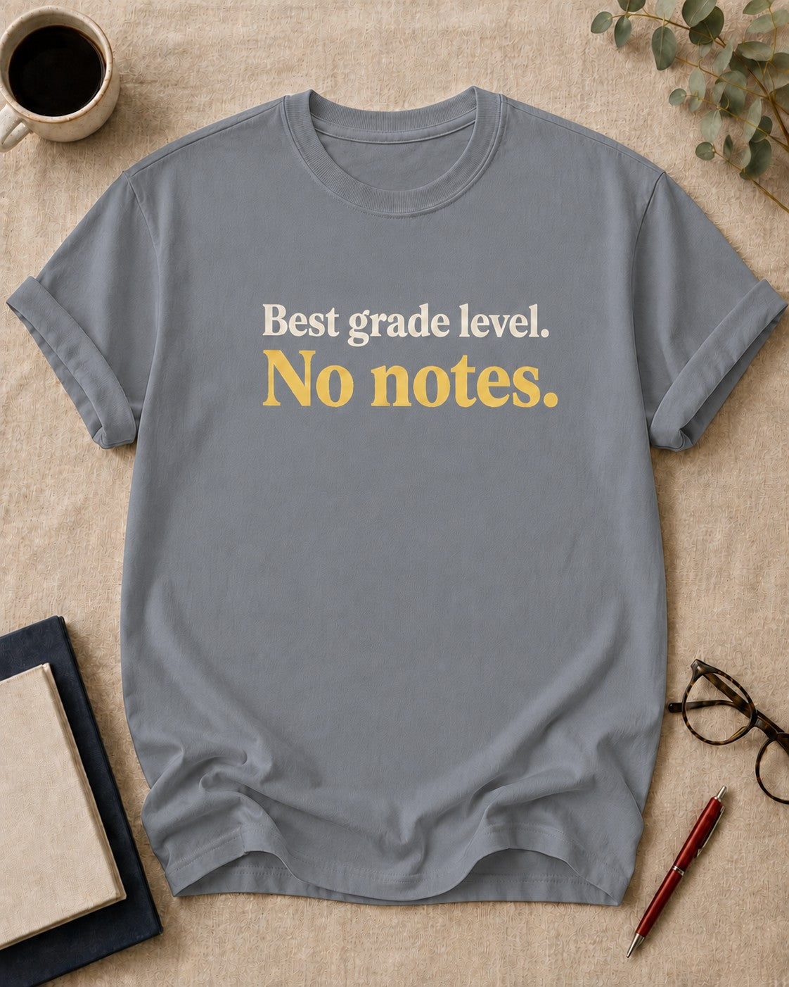 Best grade level. No notes — teacher t-shirt in Granite, flat lay