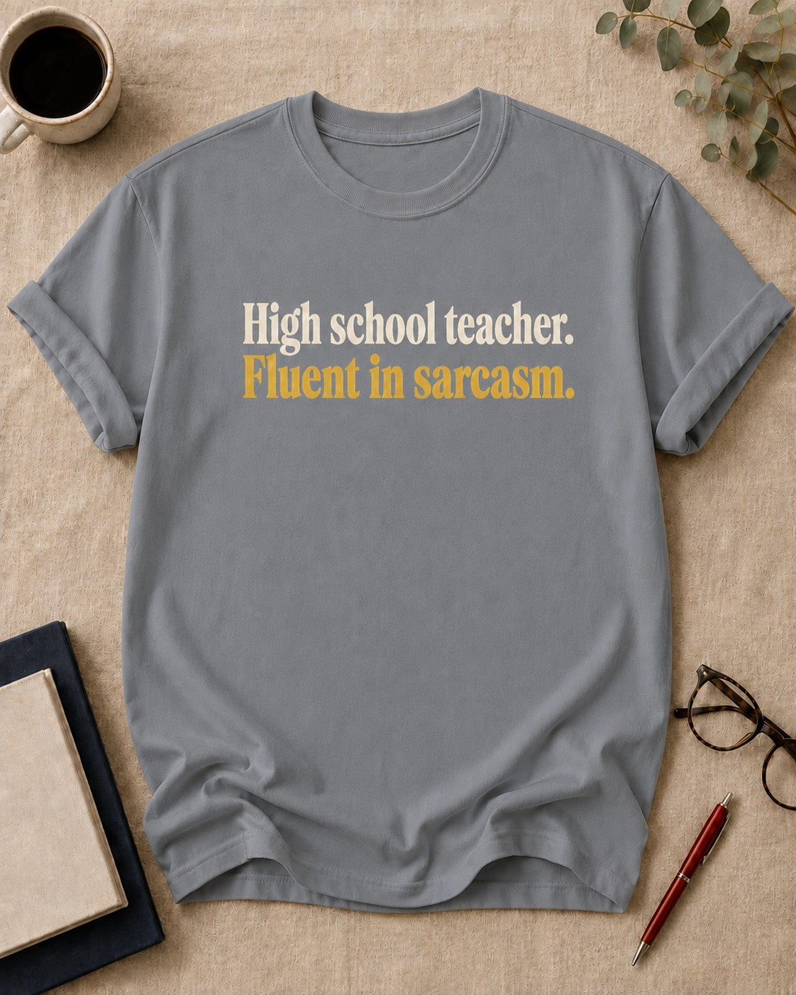 High school teacher. Fluent in sarcasm — funny t-shirt in Granite, flat lay