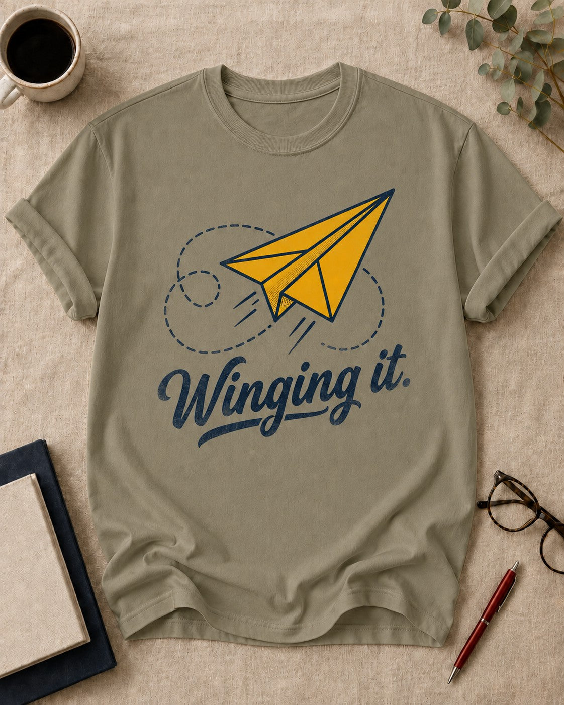 Winging it — teacher t-shirt in Khaki, flat lay