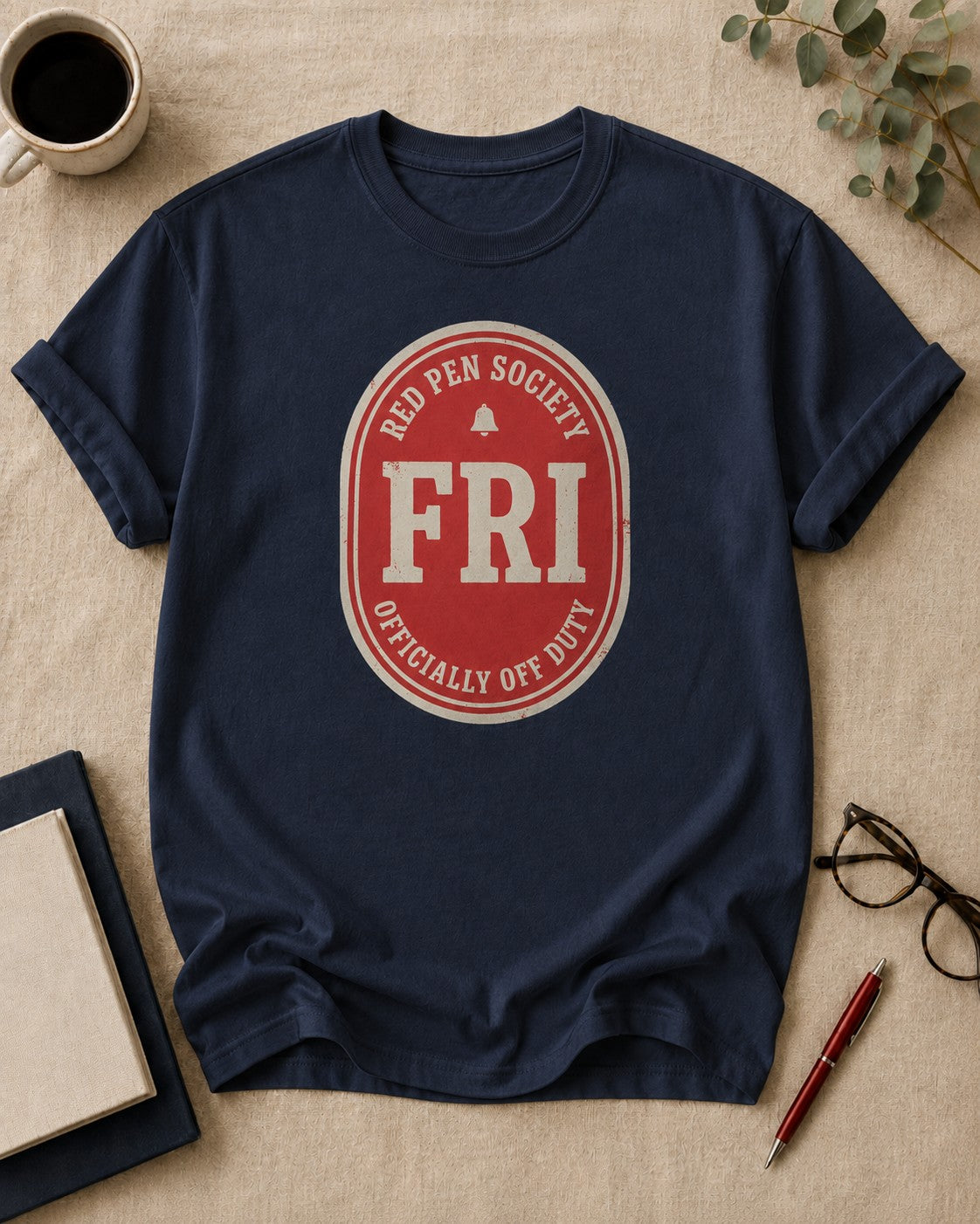 Officially off duty — teacher t-shirt in True Navy, flat lay