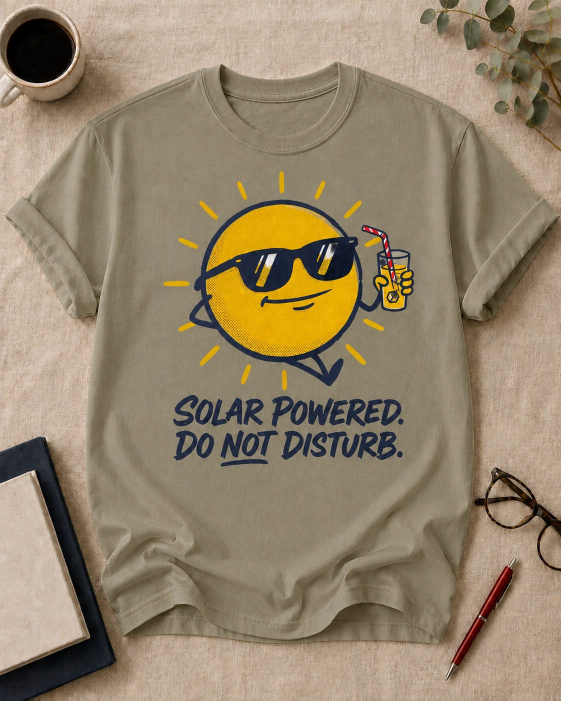 Solar powered. Do not disturb — teacher t-shirt in Khaki, flat lay