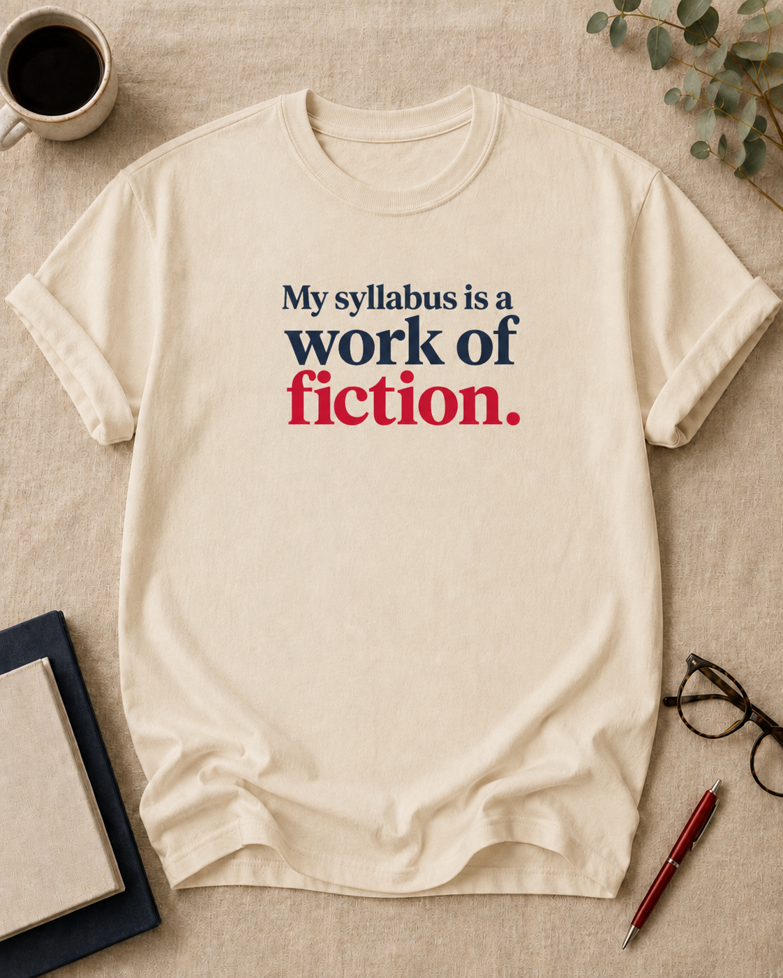 My syllabus is a work of fiction — teacher t-shirt in Ivory, flat lay