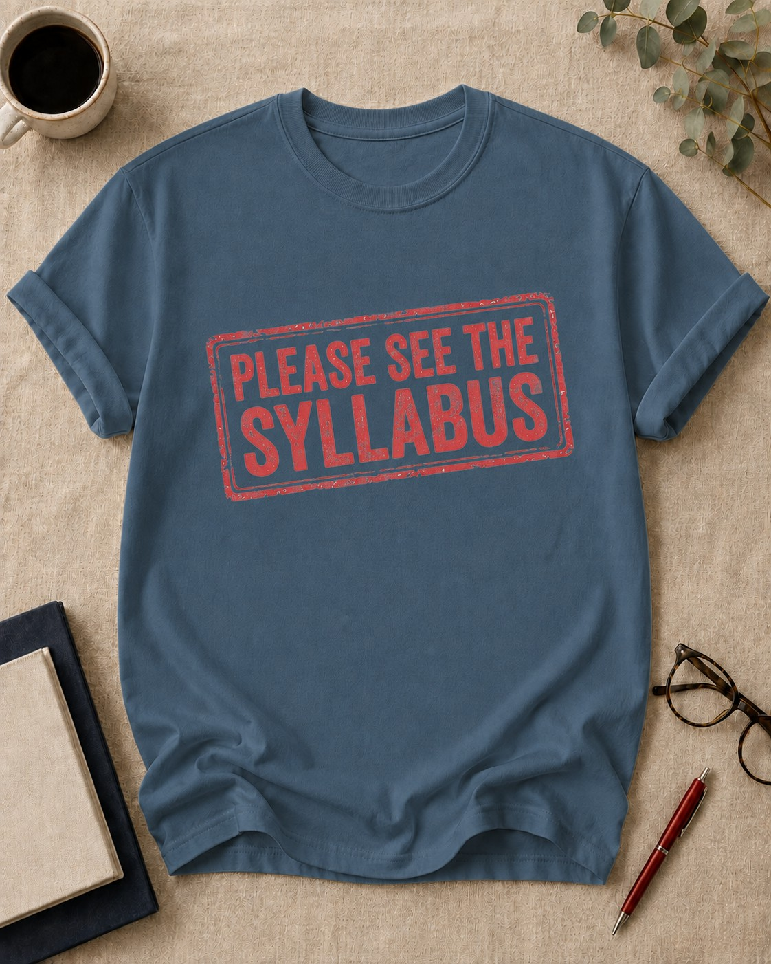 Please see the syllabus — teacher t-shirt in Blue Jean, flat lay