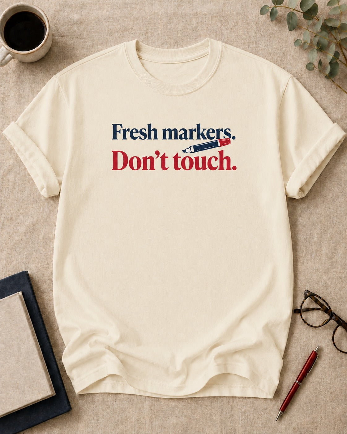 Fresh markers. Don't touch — teacher t-shirt in Ivory, flat lay