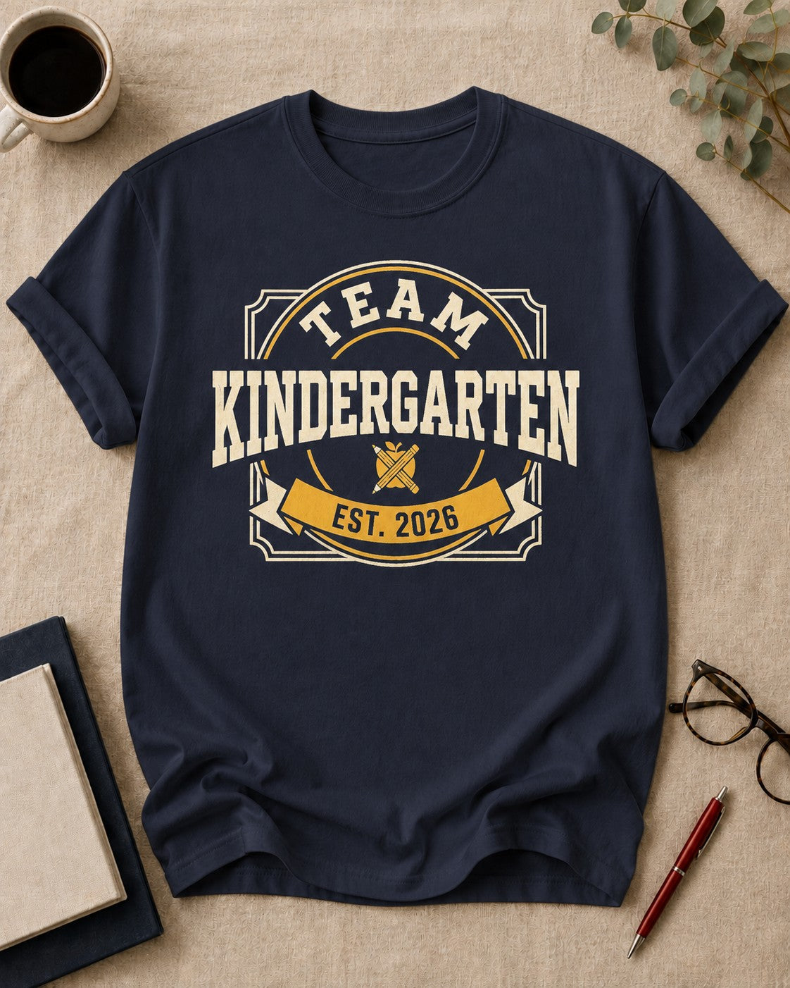 Team Kindergarten — teacher t-shirt in True Navy, flat lay