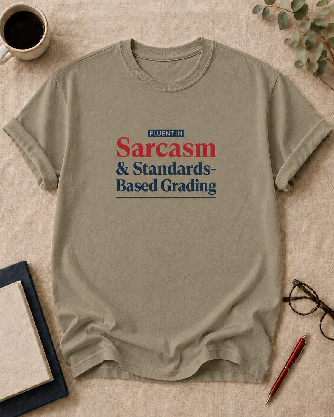 Fluent in Sarcasm and Standards-Based Grading — teacher t-shirt in Khaki, flat lay